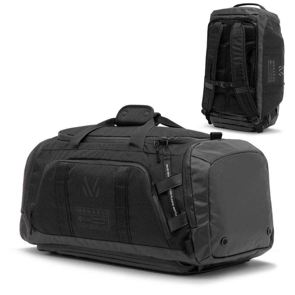 Monarc 40L Travel Duffel Backpack displayed in two orientations: as a duffel and as a backpack. The bag features robust handles, multiple compartments for organization, and a sleek black design with a UV printed Monarc logo, showcasing its versatility and durability for travel.