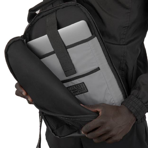 Monarc crossbody sling showing laptop pocket