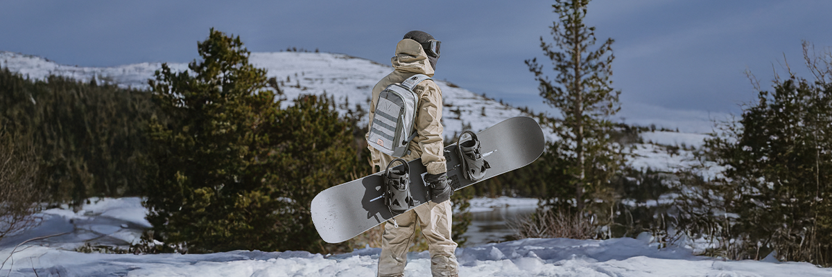 Snowboarding with crossbody sling